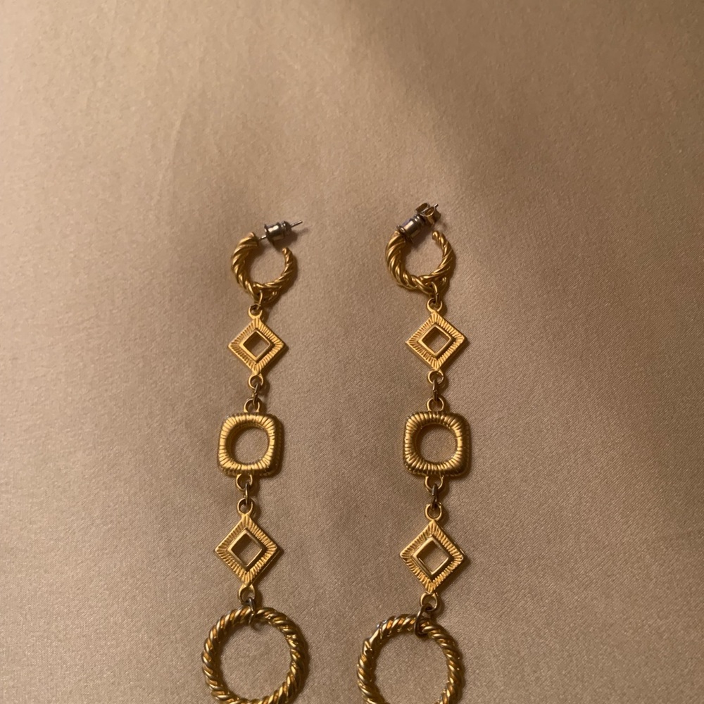 Gold tone earrings.